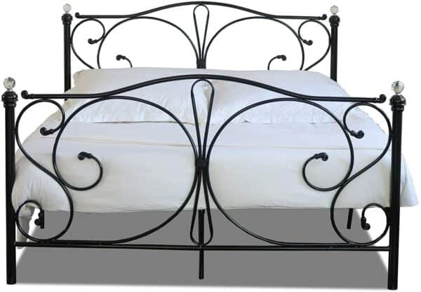 forged black metal frame with white bed sheets