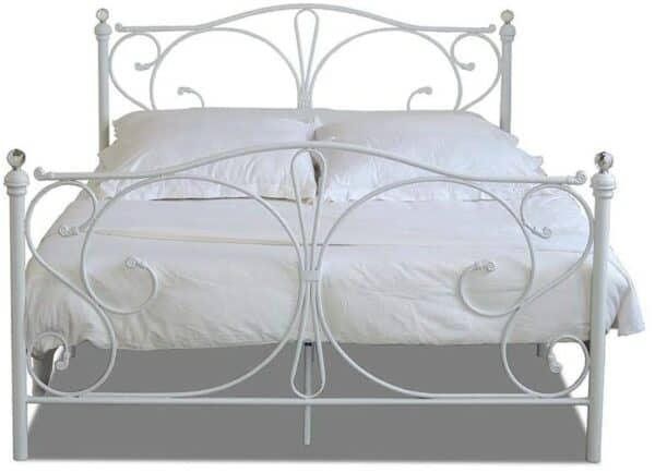 forged white metal frame with white bed sheets